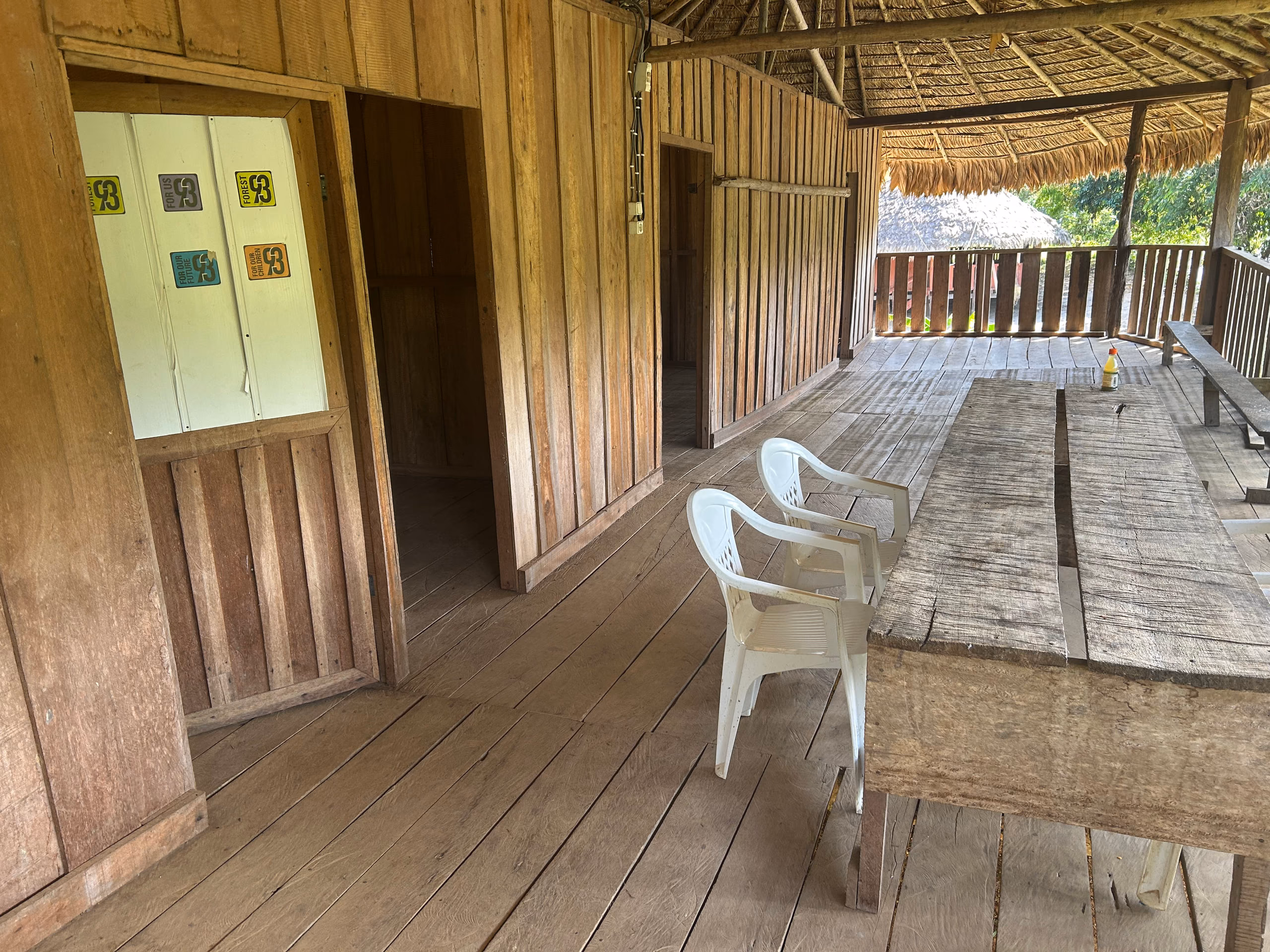 Inside the Kwamalasamutu guesthouse, looking along the veranda
